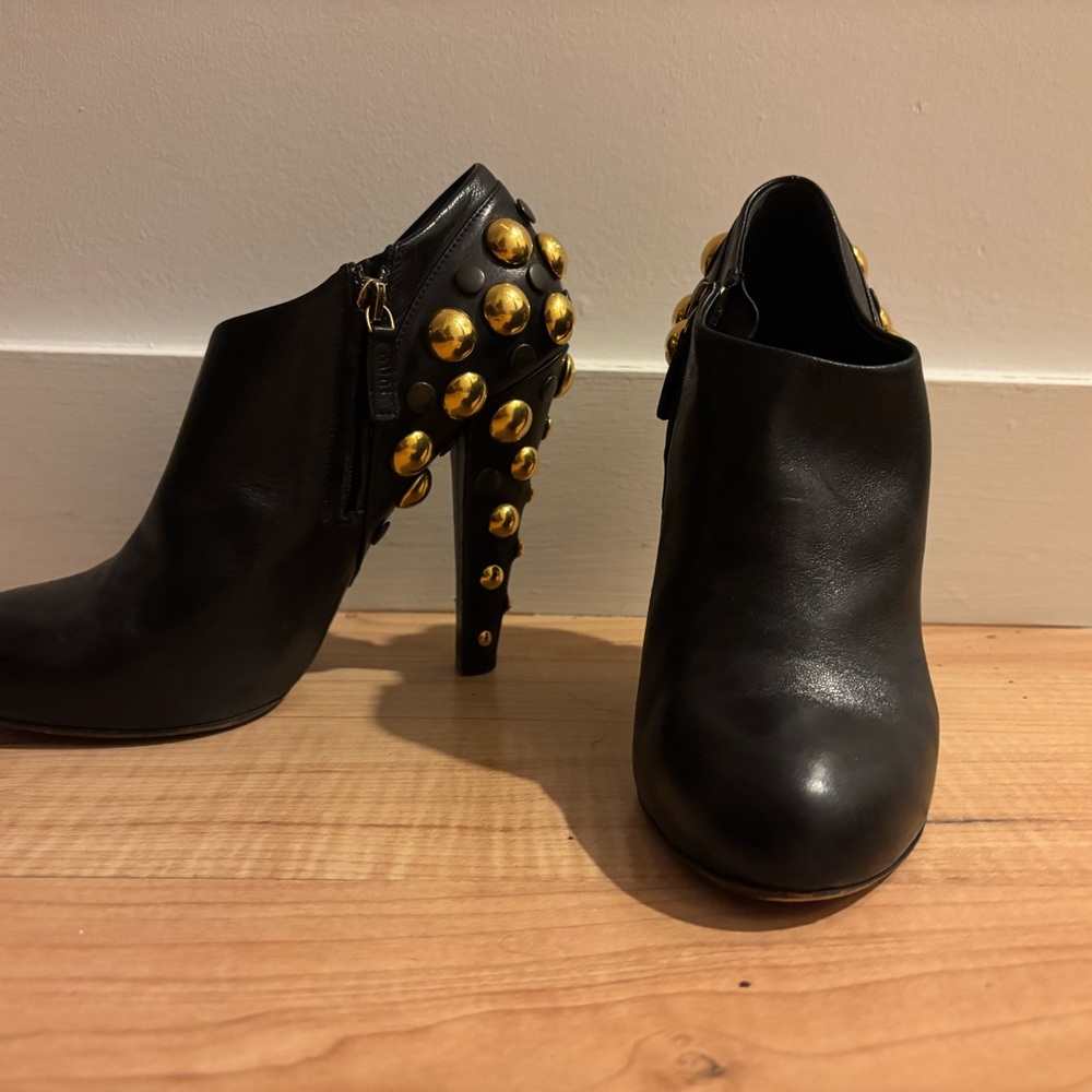 Gucci Black and Gold Heeled Boots